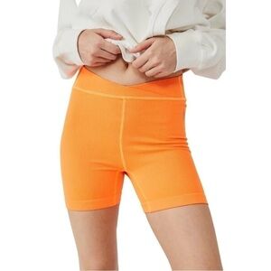FP Movement by Free People Vibrant Orange Bike Shorts